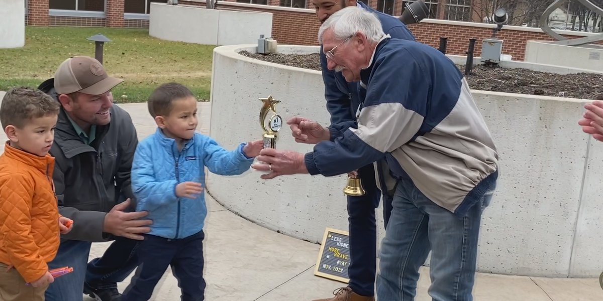 Boy receives first cancer treatment trophy