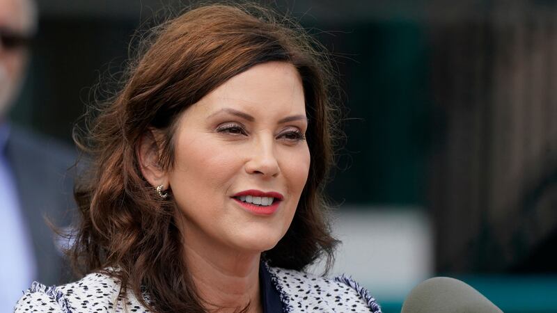 FILE - Michigan Gov. Gretchen Whitmer addresses the media after signing the final piece of a...