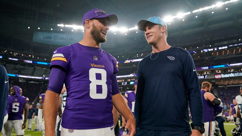 Minnesota Vikings quarterback Kirk Cousins (8) and Tennessee Titans quarterback Ryan...