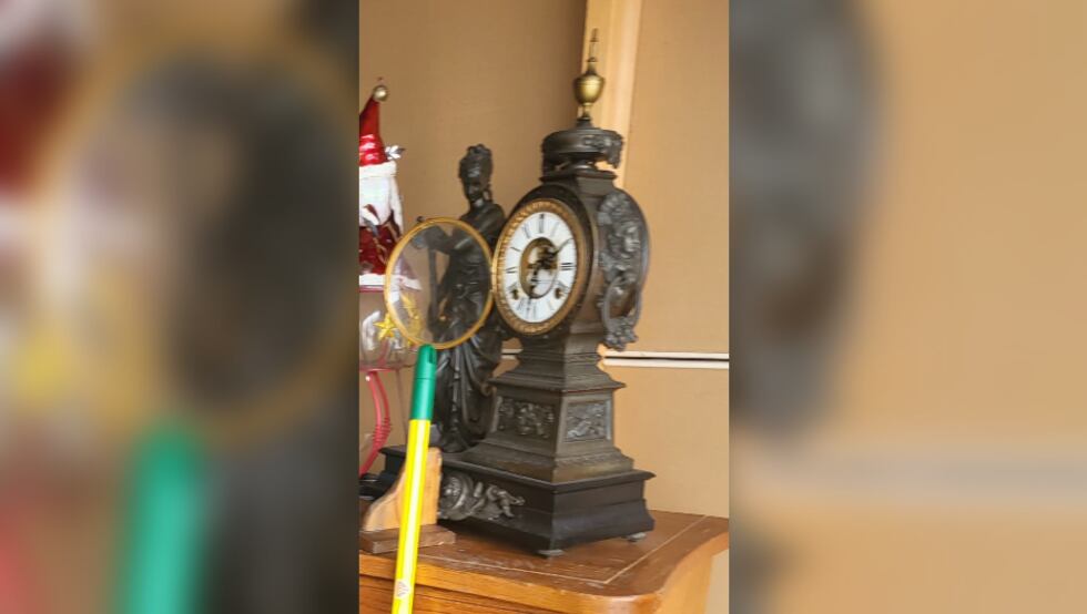 This antique clock was stolen during a garage break-in.