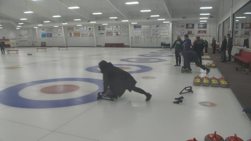 People learning how to curl.