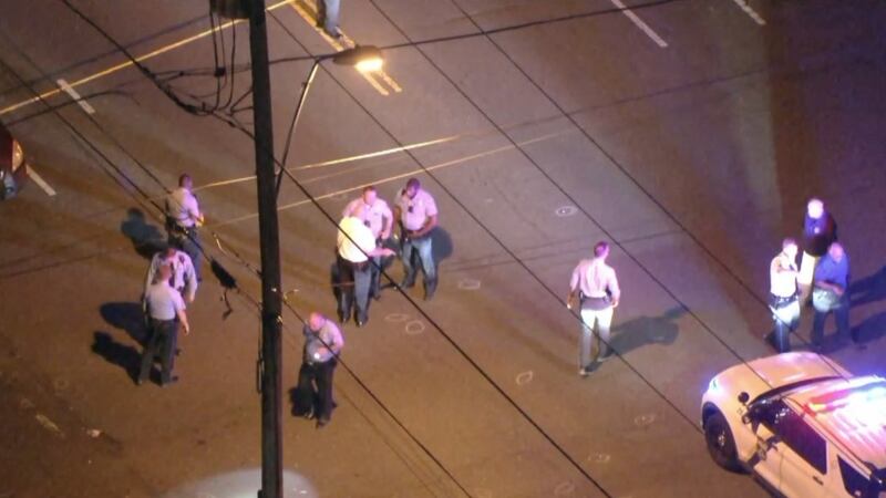 Three Philadelphia police officers responding to a home where people were arguing about a...